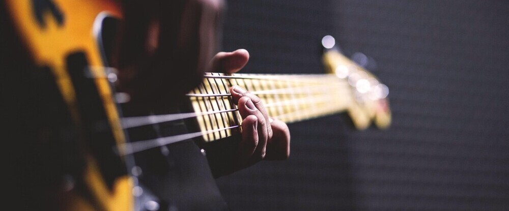 playing bass guitar
